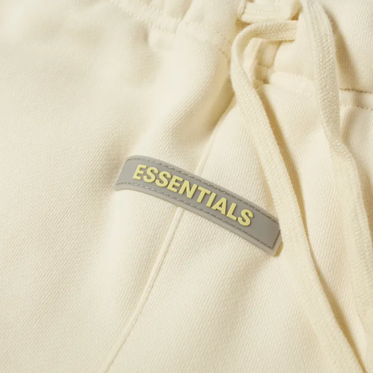 FEAR OF GOD ESSENTIALS TRACK PANTS TAUPE